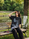DAXUEN distressed illustrative graphic tee — model photo