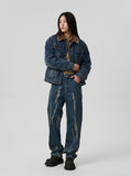 DAXUEN Distressed indigo relaxed-fit straight-leg jeans — model photo
