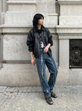 DAXUEN Distressed indigo relaxed-fit straight-leg jeans — model photo