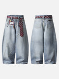 Distressed light blue baggy denim jeans