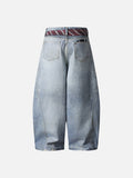Distressed light blue baggy denim jeans