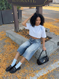 DAXUEN black wide-leg trousers with vertical pinstripes — model photo