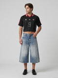 DAXUEN black wide-leg trousers with vertical pinstripes — model photo