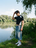 DAXUEN black wide-leg trousers with vertical pinstripes — model photo