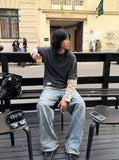 DAXUEN Distressed light blue wide leg denim jeans — model photo