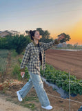 DAXUEN Distressed light blue wide leg denim jeans — model photo