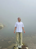 DAXUEN Men's short-sleeved loose fit t-shirt with distressed details — model photo