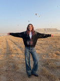 DAXUEN medium wash distressed wide-leg jeans with studs — model photo