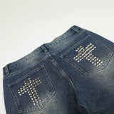 DAXUEN medium wash distressed wide-leg jeans with studs