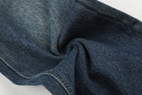 DAXUEN medium wash distressed wide-leg jeans with studs