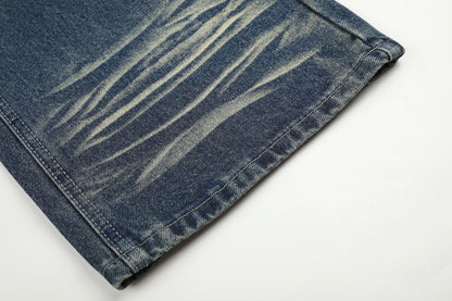 DAXUEN medium wash distressed wide-leg jeans with studs