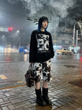DAXUEN black oversized multi-panel graphic tee — model photo
