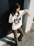 DAXUEN black oversized multi-panel graphic tee — model photo
