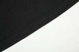 DAXUEN black long sleeve distressed musical-note graphic top