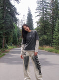 DAXUEN light beige distressed number 10 wide-leg pants — model photo