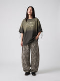 DAXUEN distressed ombre vintage graphic t-shirt — model photo
