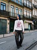 DAXUEN black long-sleeve tee with distressed open-mouth graphic — model photo