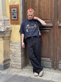 DAXUEN black oversized distressed animal graphic tee — model photo