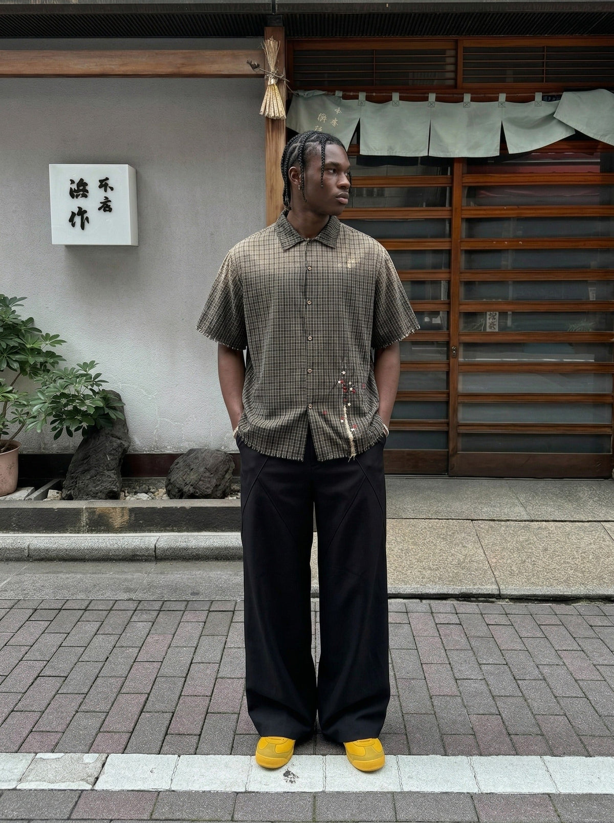 DAXUEN Oversized plaid button-up shirt with embroidery — model photo