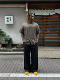 DAXUEN Oversized plaid button-up shirt with embroidery — model photo