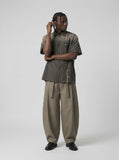 DAXUEN Oversized plaid button-up shirt with embroidery — model photo