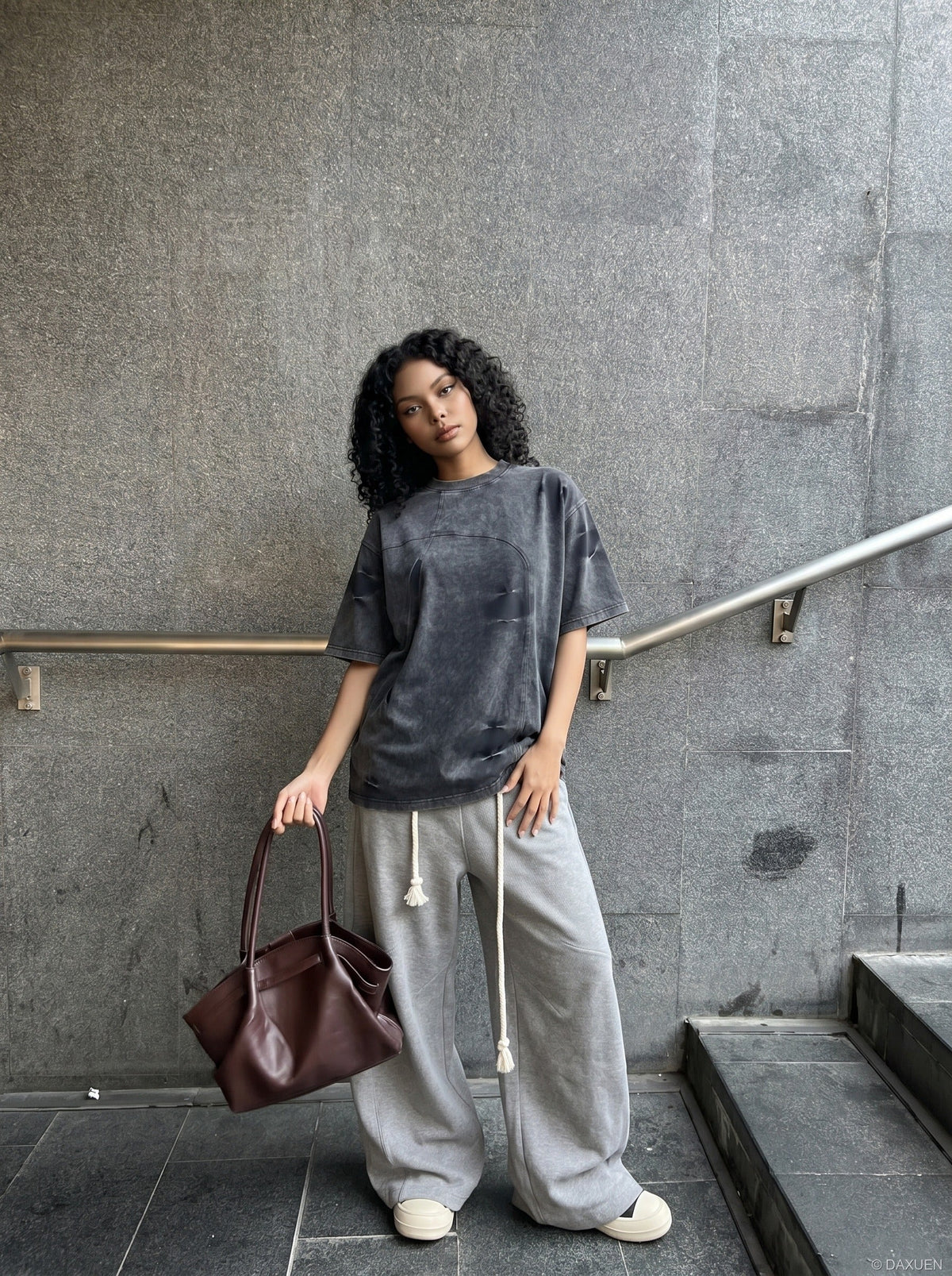DAXUEN Distressed oversized short-sleeved t-shirt in grey — model photo