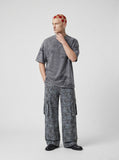 DAXUEN Distressed oversized short-sleeved t-shirt in grey — model photo