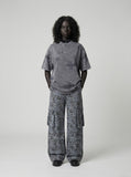 DAXUEN Distressed oversized short-sleeved t-shirt in grey — model photo
