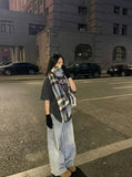 DAXUEN Distressed oversized short-sleeved t-shirt with graphics — model photo