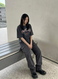 DAXUEN Distressed oversized short-sleeved t-shirt with graphics — model photo