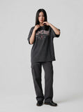 DAXUEN Distressed oversized short-sleeved t-shirt with graphics — model photo