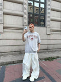 Distressed Oversized T-Shirt with Graphics