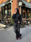 DAXUEN Distressed black wide-leg denim jeans with paint splatters — model photo
