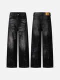 DAXUEN Distressed black wide-leg denim jeans with paint splatters
