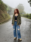 DAXUEN Distressed medium-blue wide leg denim jeans with paint splatters — model photo