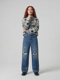 DAXUEN Distressed medium-blue wide leg denim jeans with paint splatters — model photo