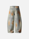 Distressed paint-splatter wide-leg denim jeans