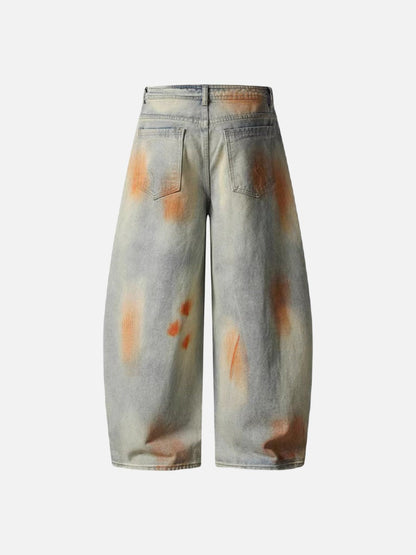 Distressed paint-splatter wide-leg denim jeans