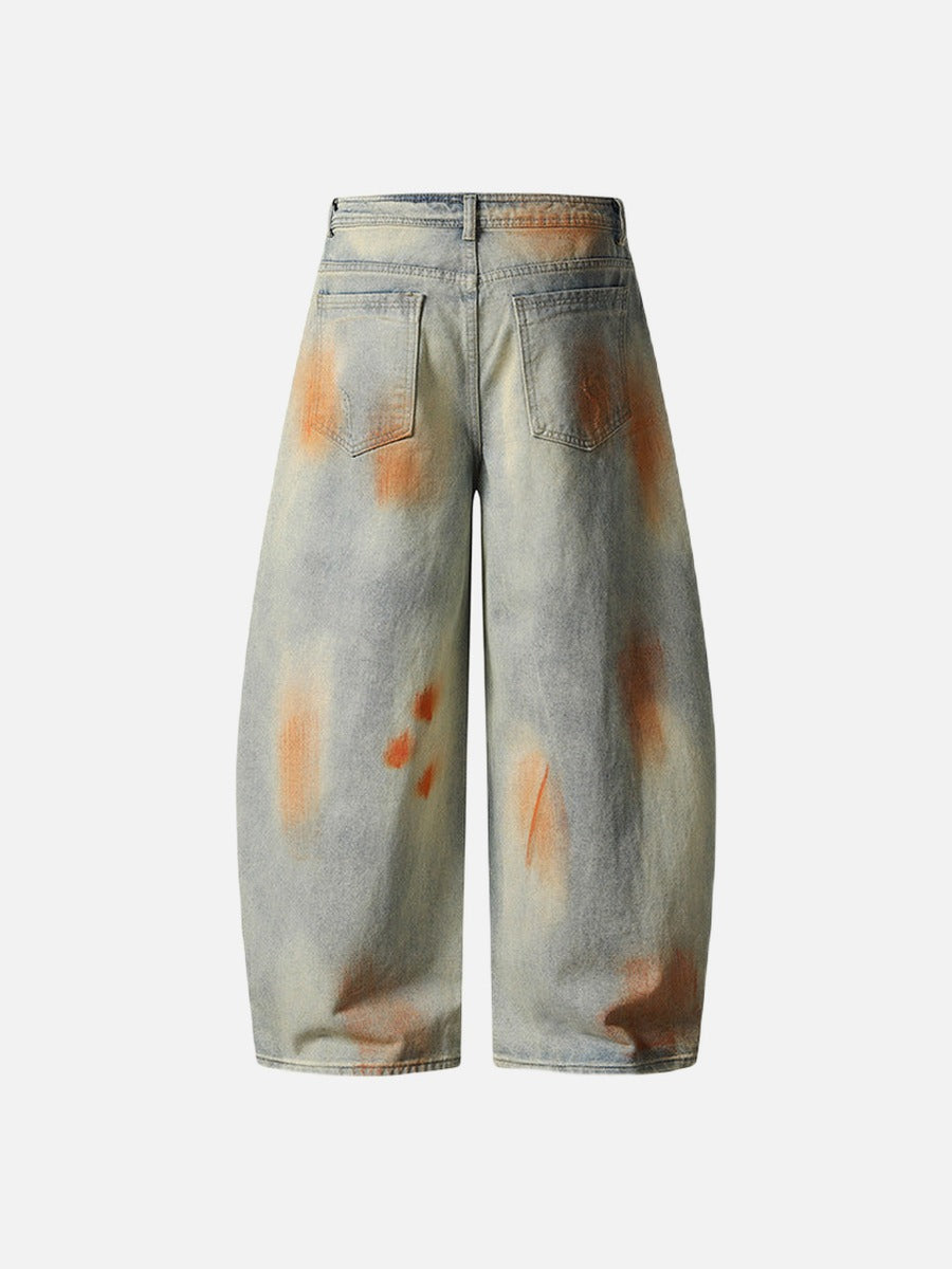 Distressed paint-splatter wide-leg denim jeans