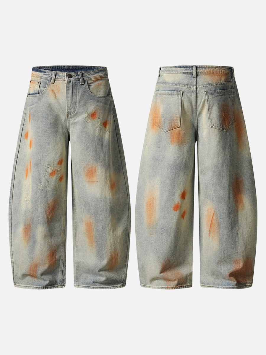 Distressed paint-splatter wide-leg denim jeans
