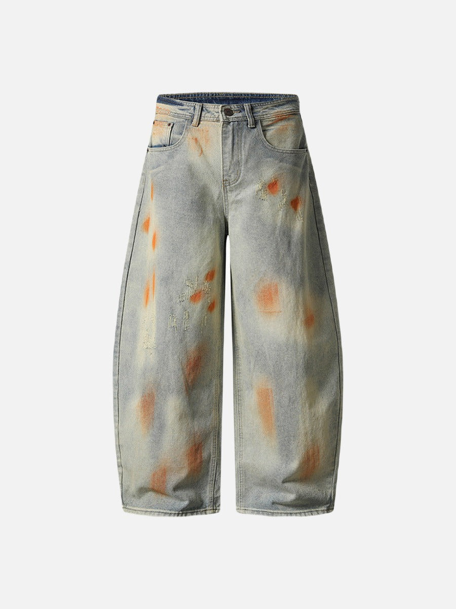 Distressed paint-splatter wide-leg denim jeans