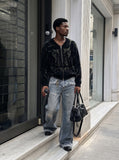 DAXUEN light to medium blue distressed patchwork wide-leg denim jeans — model photo