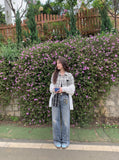 DAXUEN light to medium blue distressed patchwork wide-leg denim jeans — model photo