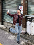 DAXUEN light to medium blue distressed patchwork wide-leg denim jeans — model photo