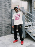 DAXUEN brown oversized distressed pink block graphic layered tee — model photo