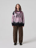DAXUEN pink oversized splatter graphic sweater — model photo