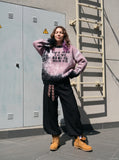 DAXUEN pink oversized splatter graphic sweater — model photo