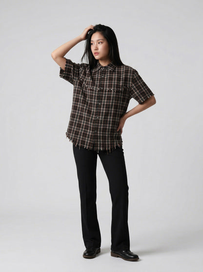 DAXUEN Distressed plaid button-up shirt with frayed edges — model photo