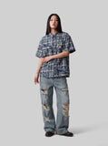 DAXUEN blue and black distressed plaid button-up shirt — model photo