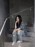 DAXUEN blue and black distressed plaid button-up shirt — model photo